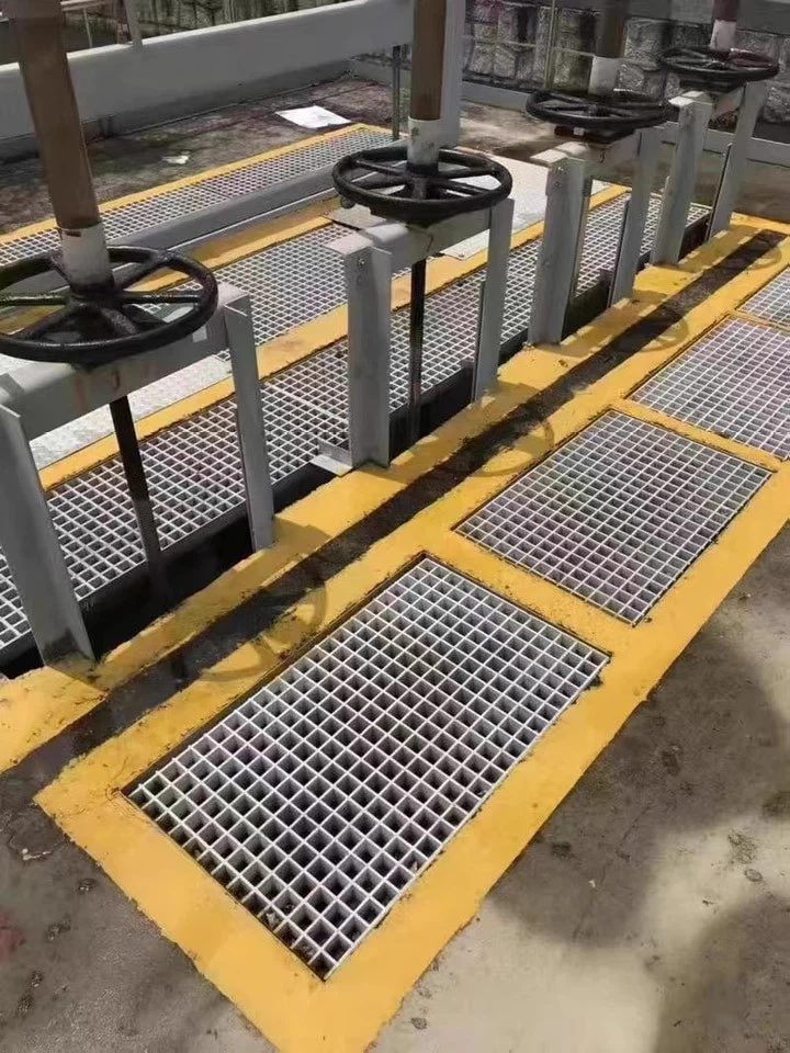 FRP grating installed on an industrial platform in the USA for safe walkways and access systems FRP grating installed on an industrial platform in the USA for safe walkways and access systems